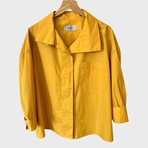 NKC Women's oversized high collar button down mustard top.